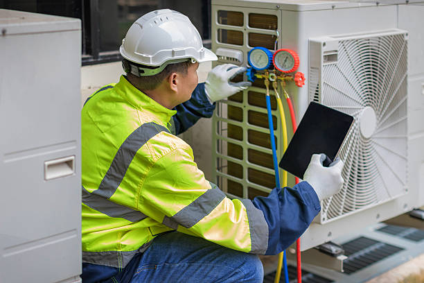 Professional Air Duct Cleaning technician working in Great River, NY